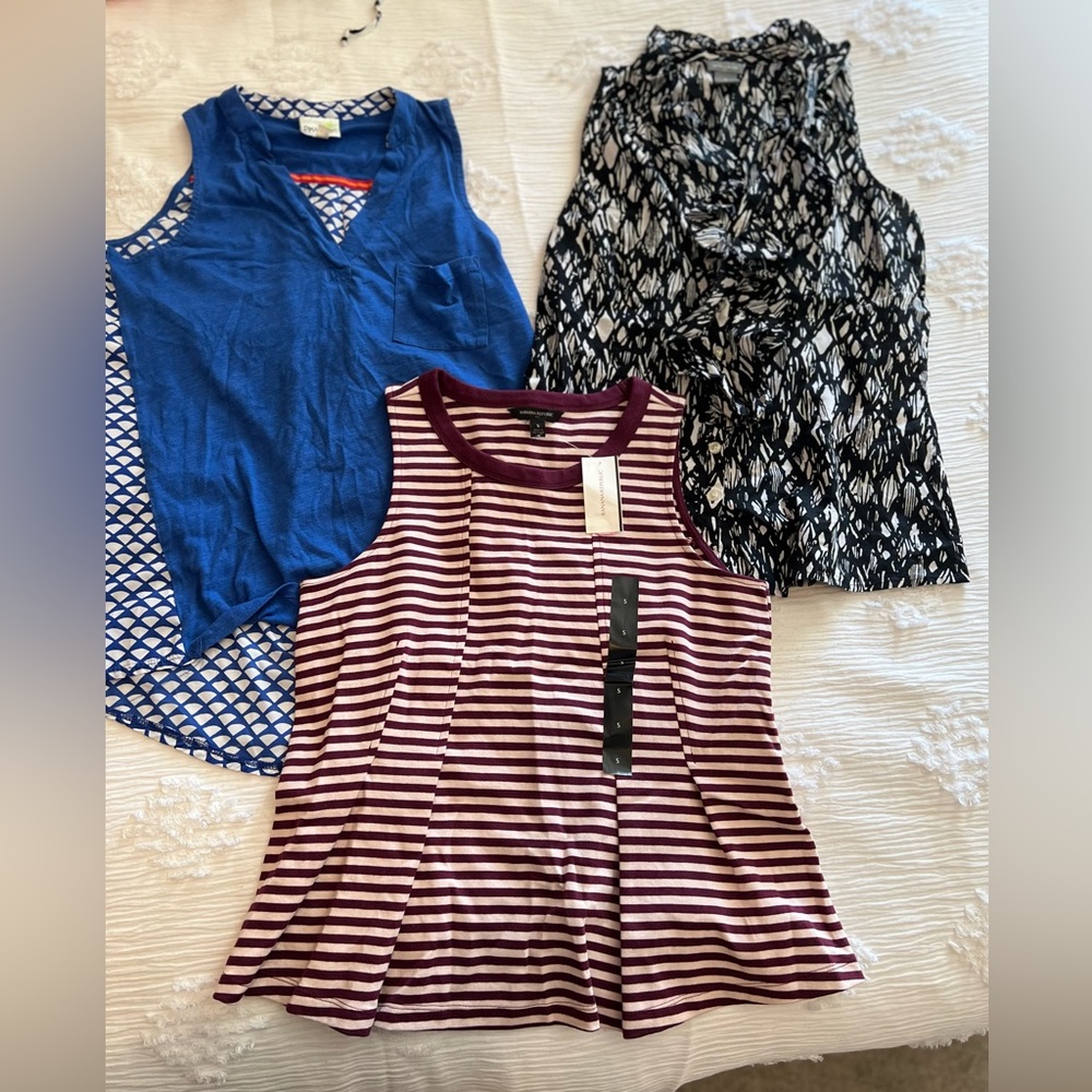 Group of 3 dress sleeveless tops